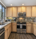 Kitchen with windows view & stove
